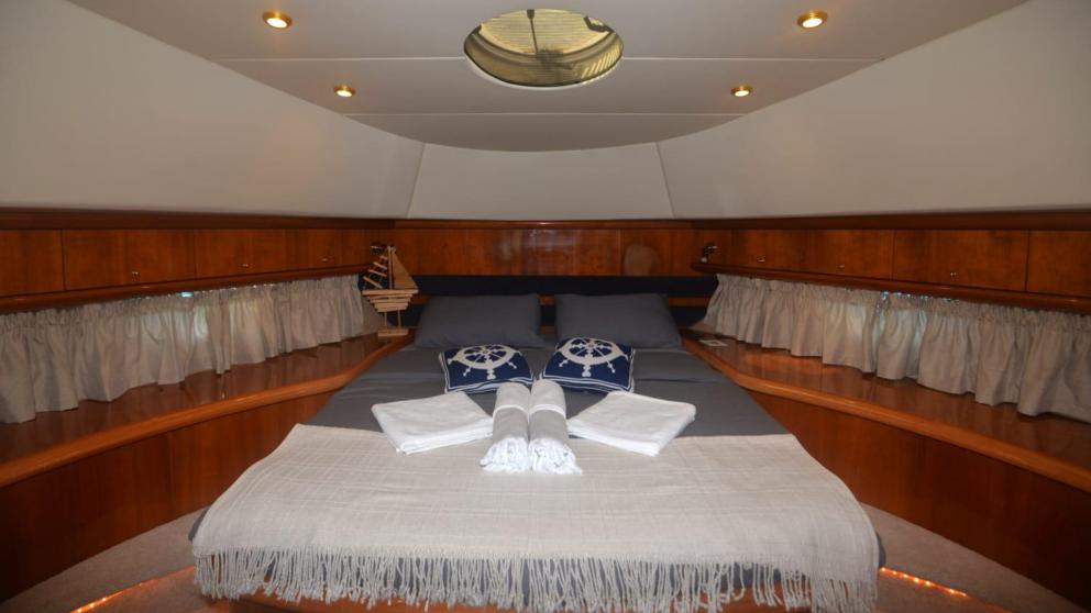 Bedroom with a king size bed, decorated with a marine theme